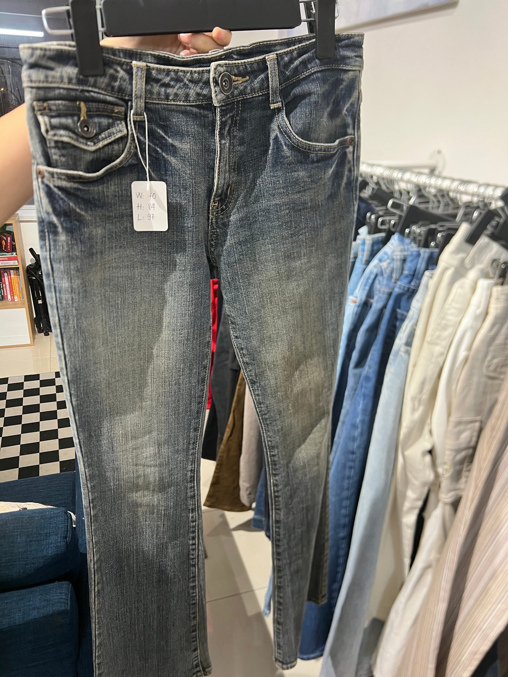 Retro high-waisted Levi’s jeans hanging out at Inspirée Vintage thrift shop in Ho Chi Minh City